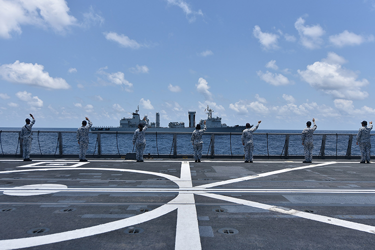 RSN personnel waving to People's Liberation Army during Passage Exercise in Sep 2021 (RSN)